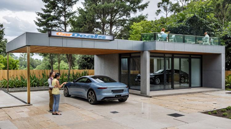 Kompaktes, modulares Autohaus mit Carport und Dachterrasse